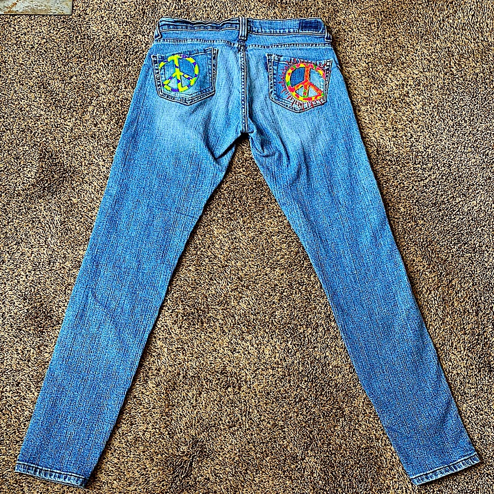 Really cool Tilted 504 Levi’s Jeans with Painted Peace Symbol on back